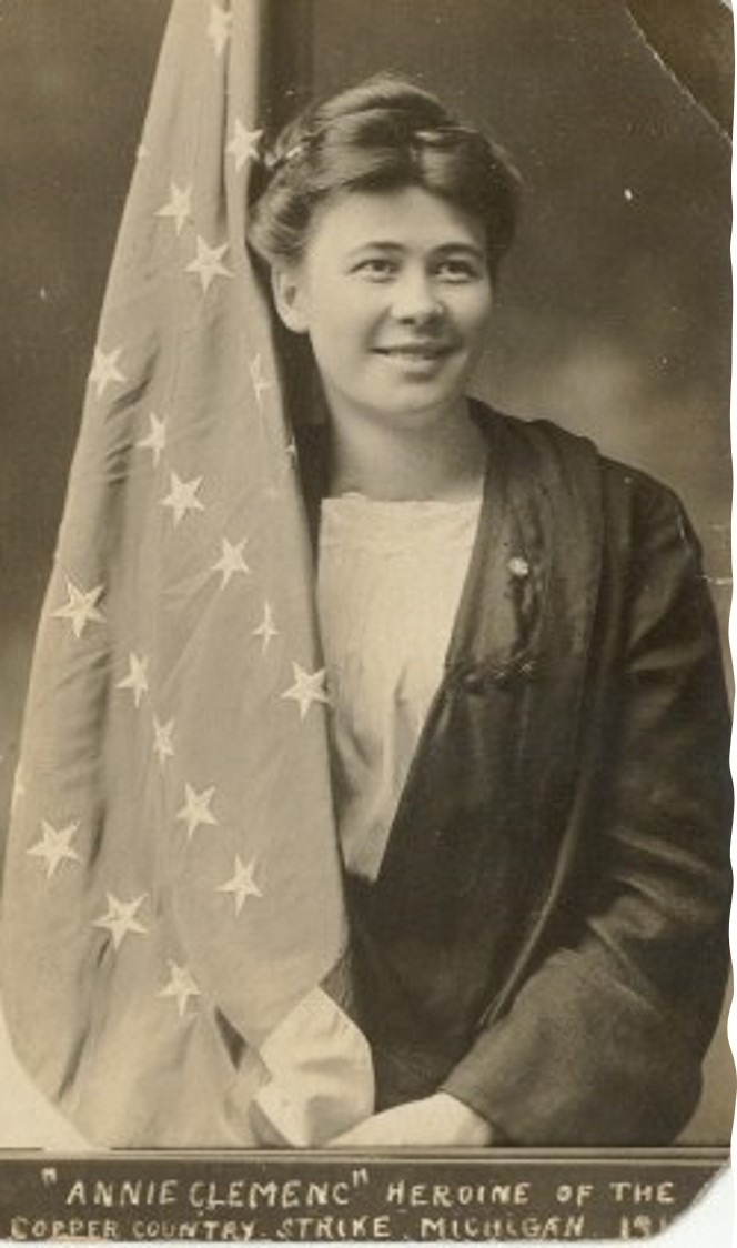 Black and white photo of Anna Clemenc, partially draped with a starred flag.