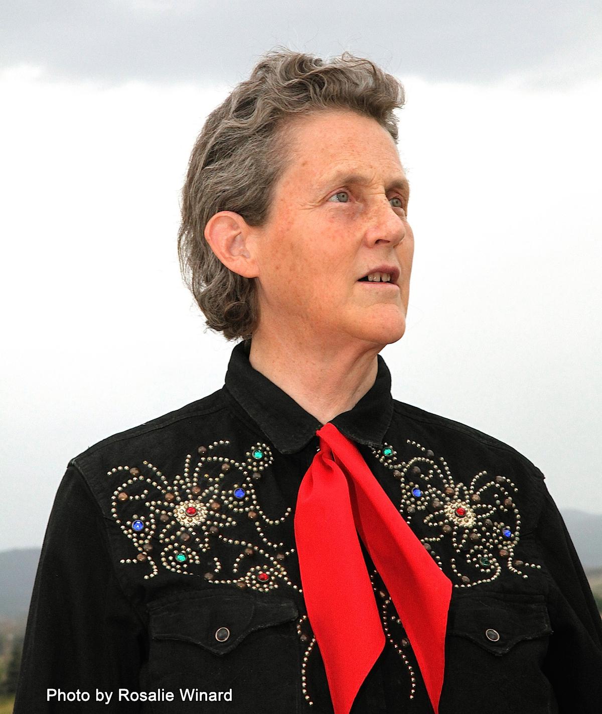 Image of Temple Grandin wearing a black shirt and red tie